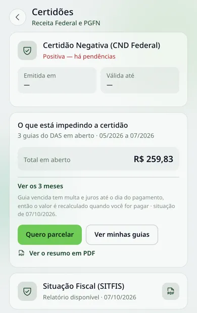 Tela do app com as guias do DAS vencidas, o total em aberto e os botões Quero parcelar e Ver minhas guias